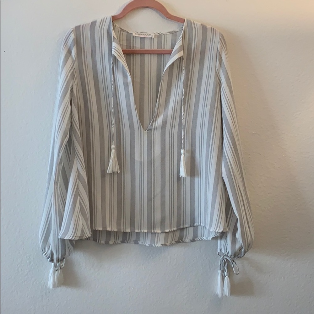 Stripped blouse with tassel detailing